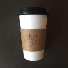 Load image into Gallery viewer, Personalized Natural Brown Kraft Custom Coffee Sleeves, White Cups and Black Lids - Script Name + Name Graphic